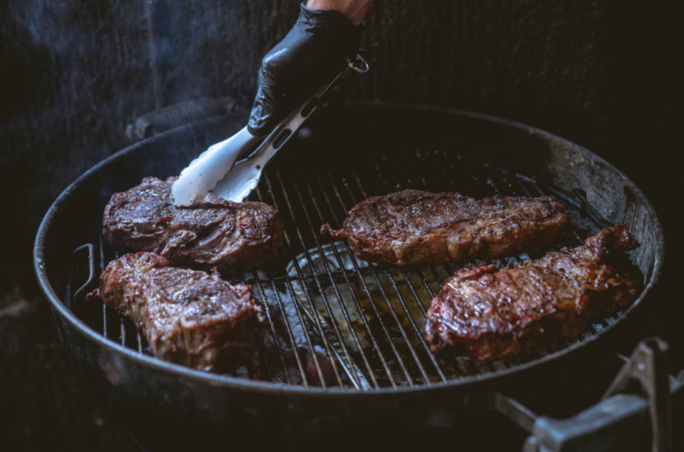 Utah Catering Companies Grilling Steaks
